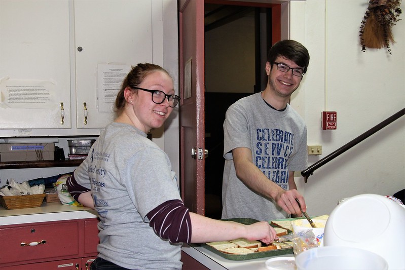 two students working in a kitchen