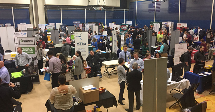 Organizations talk to prospective employers at a past Alfred State Career Fair.