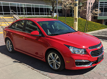 a red 2016 Chevy Cruze Limited