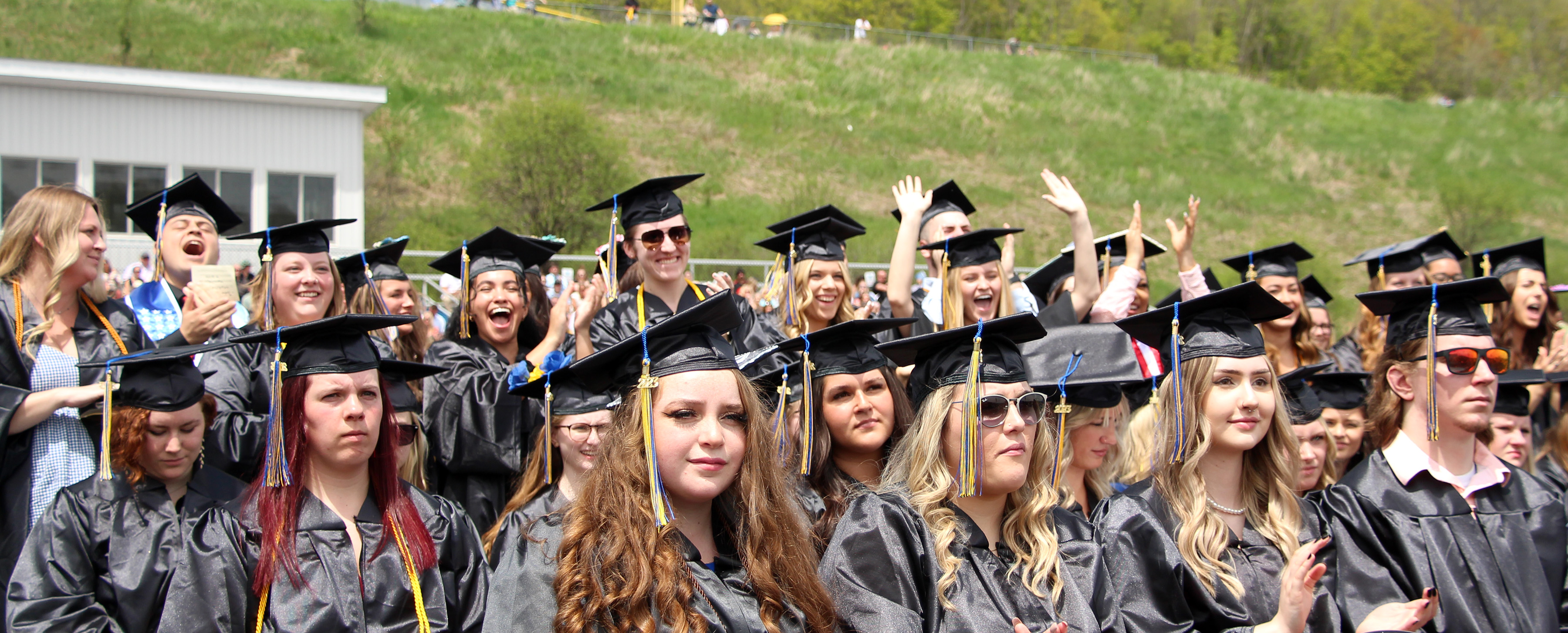 Graduates celebrate fellow graduates