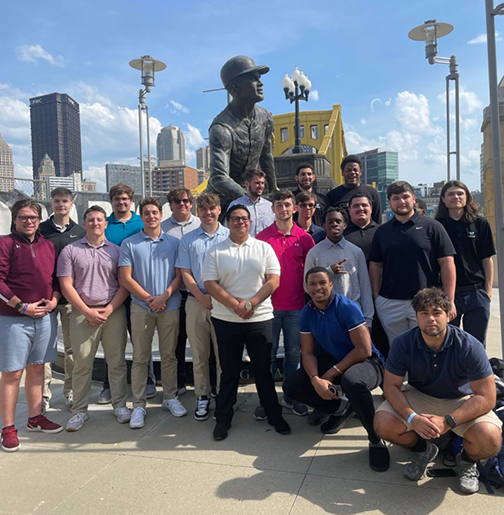 group of students standing outside for a photo