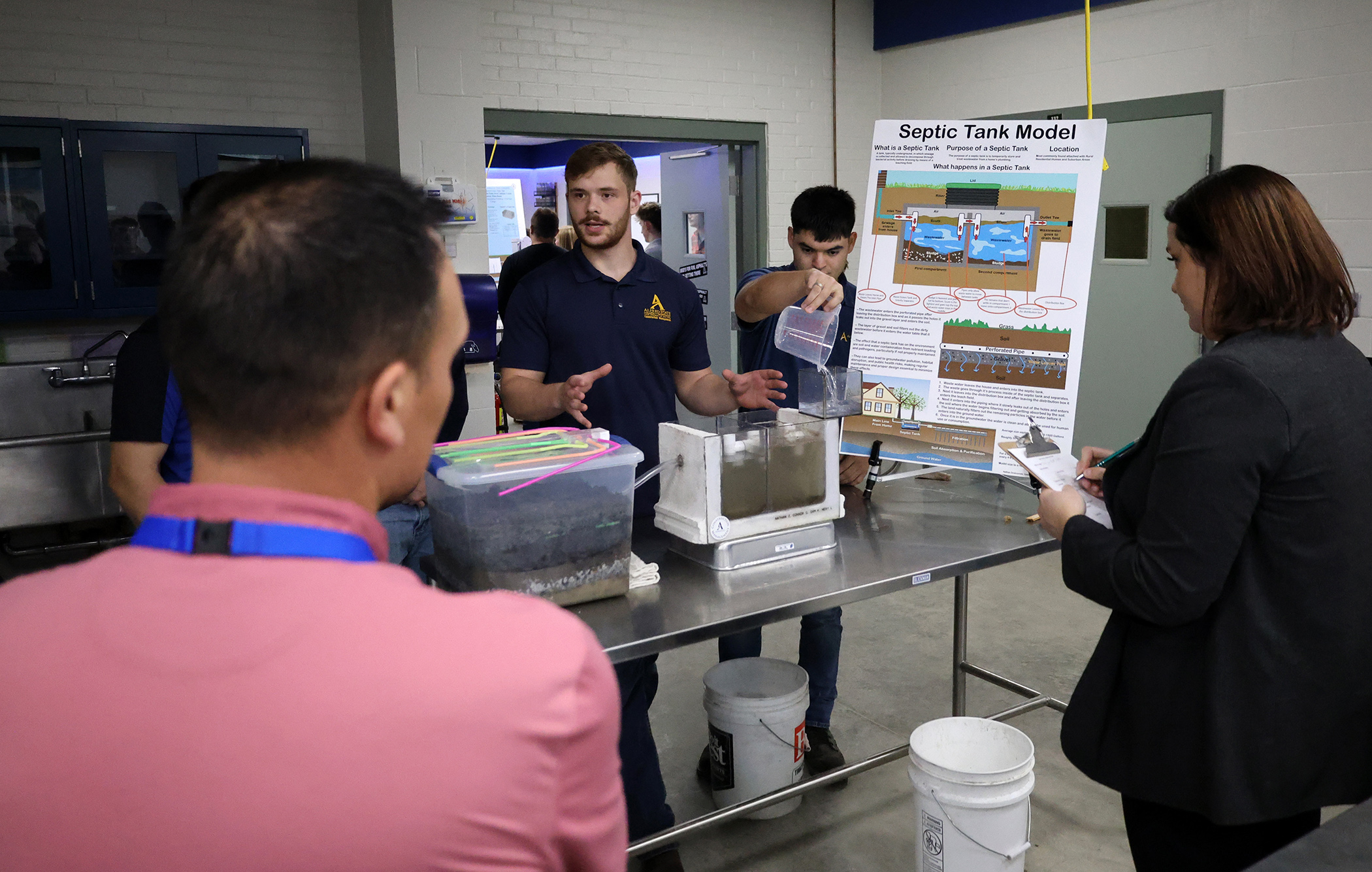 winning team discusses project with judges