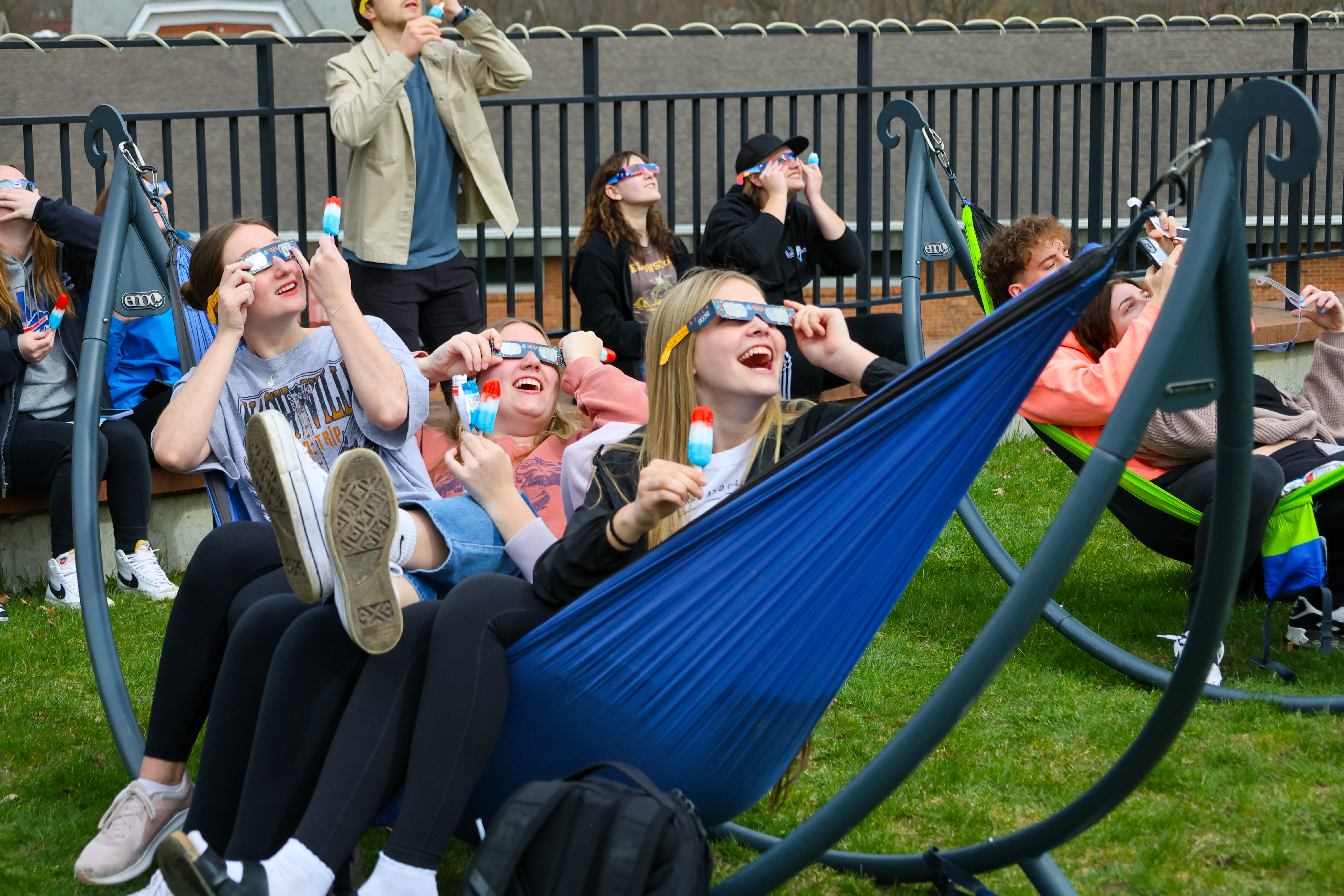 students enjoy the solar eclipse