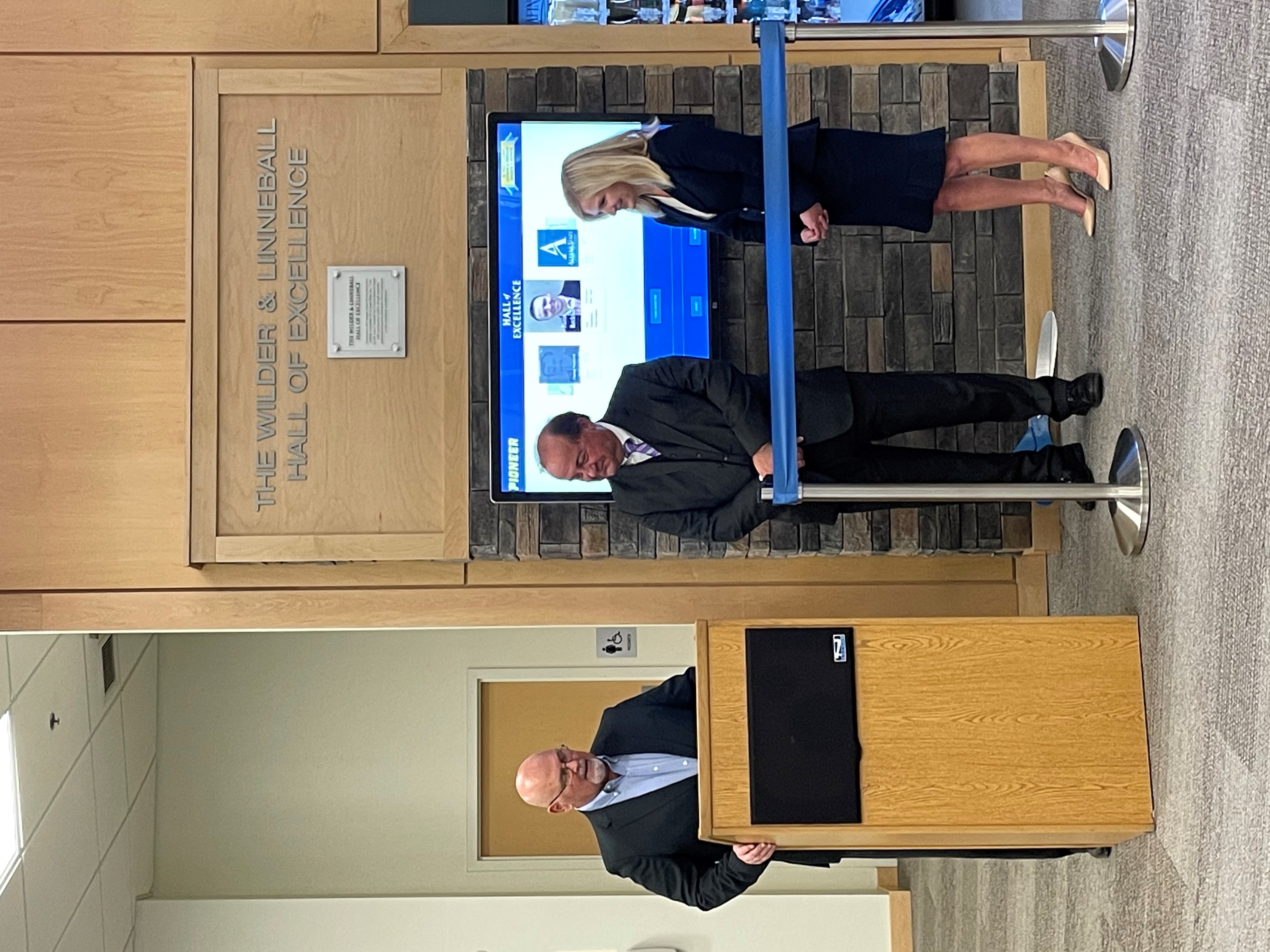 President Sullivan, Jay Wilder, and Laura Linneball at Hall of Excellence ribbon-cutting 