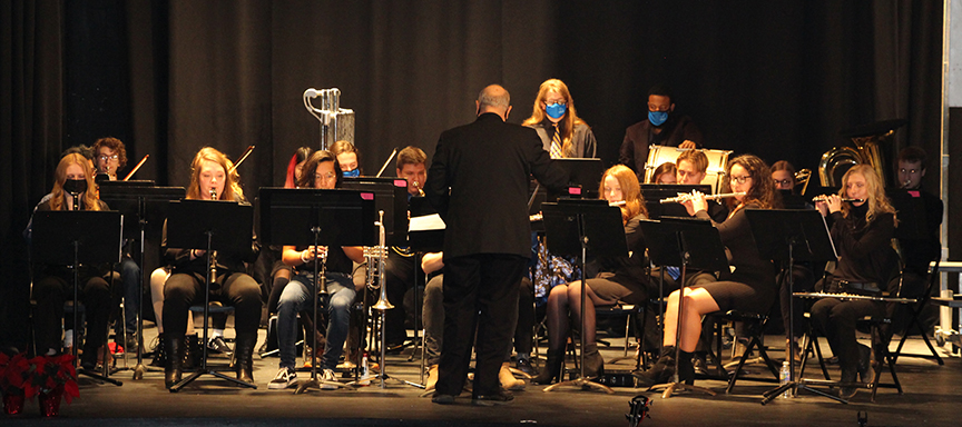 The concert band performs at their winter concert.