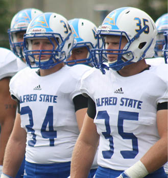 two football players in helmets