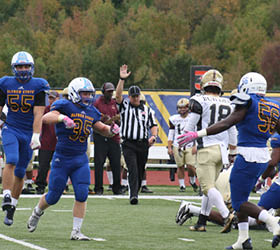 football game on the field, players