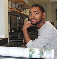 Caleb Boyce-Wright sitting at a desk