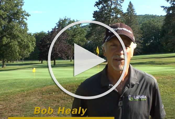 Robert Healy on a golf course with play button to youtube video
