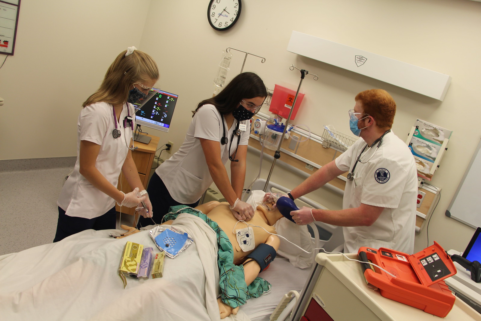 Alfred State nursing students work in a simulation lab.