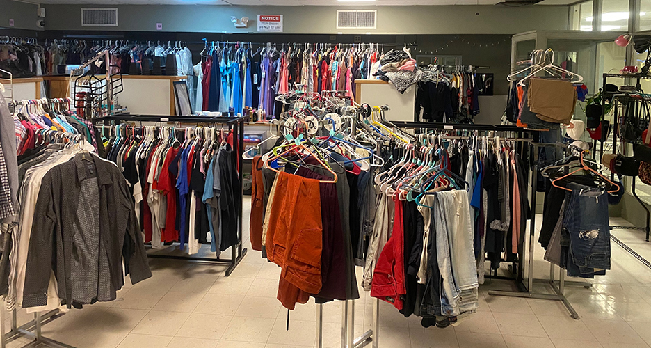 many, many clothes on racks inside the Pioneer Exchange