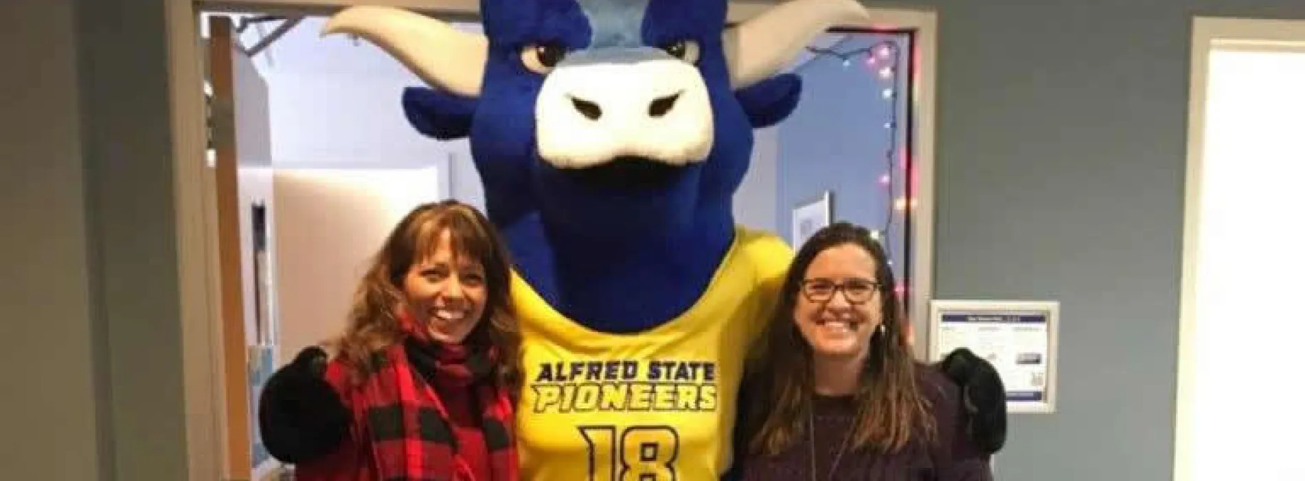 Elaine, Big Blue the ox mascot, and Maureen