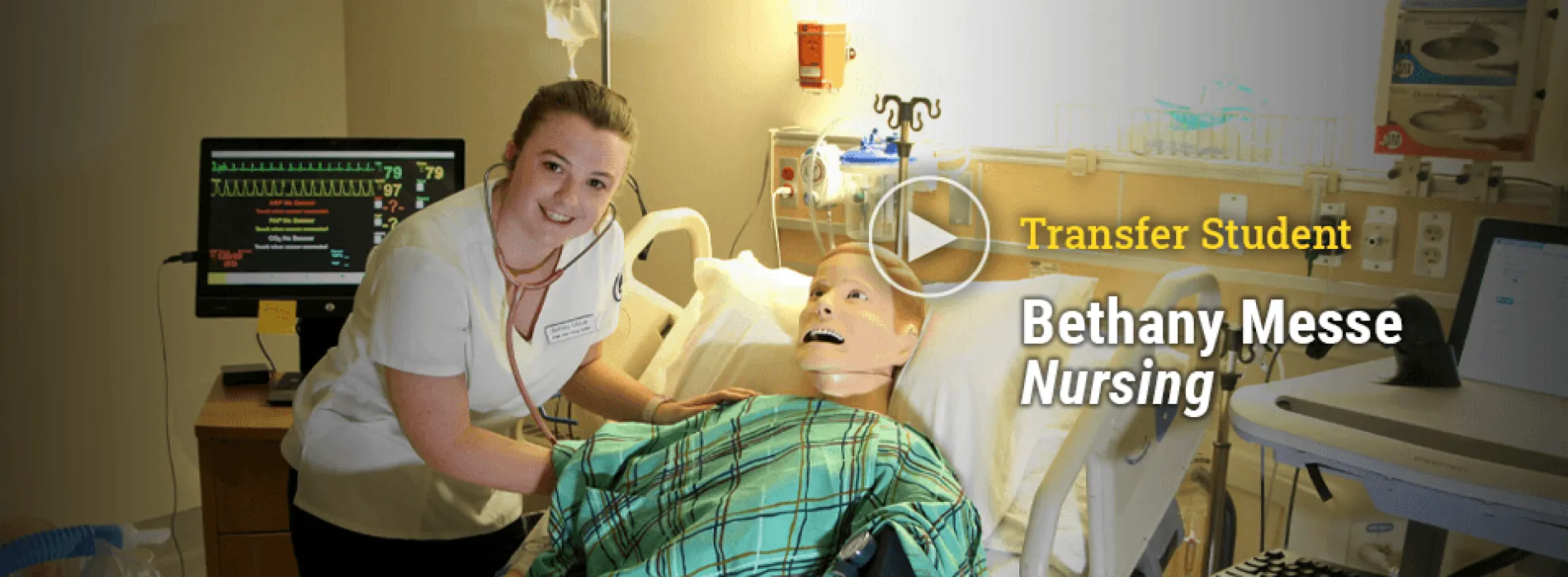 Link to video of: Transfer Student Bethany Messe, Nursing. Play button. Image of Bethany in nursing simulation lab.
