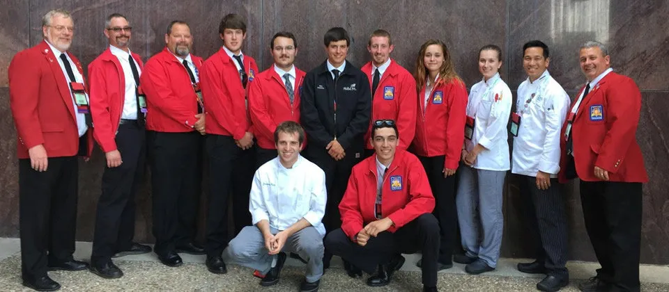 students wearing red suit coats at SkillsUSA competition