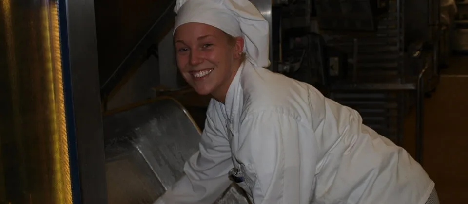 female culinary student in uniform