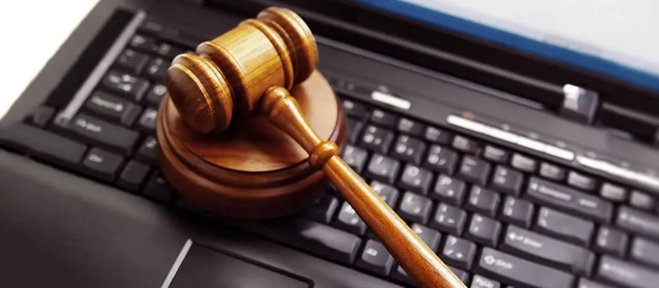 gavel on top of a keyboard
