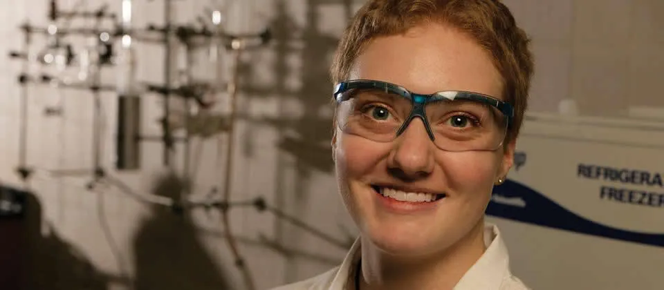 student wearing safety glasses in a lab