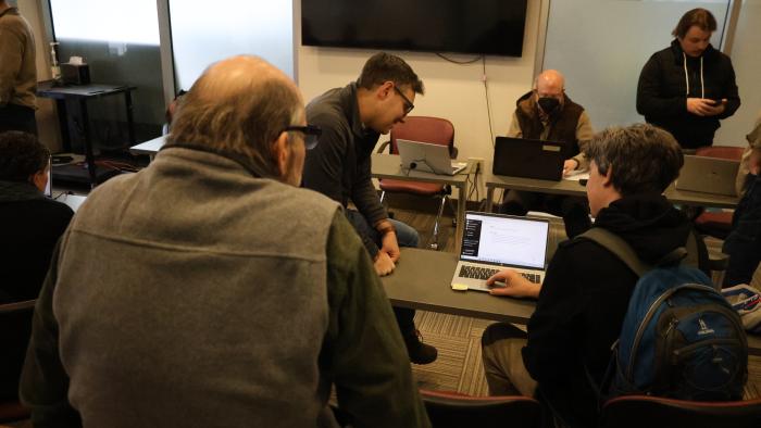 Faculty and staff learn about new AI tools.