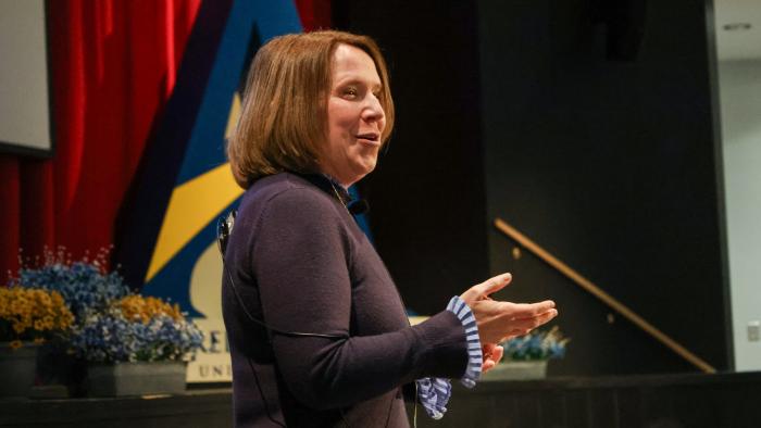 Carrie Cokely adresses faculty and staff.