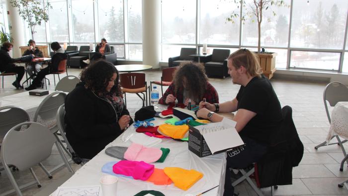 Students decorate their own beanies at Winter Carnival.