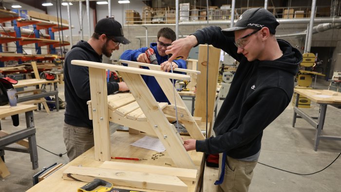 Students building a chair