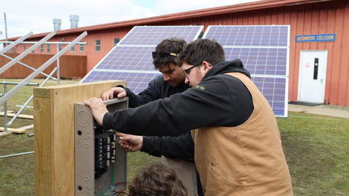 Students put together a circuit box.