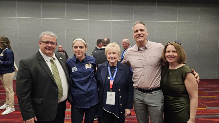 Amanda Snyder with Alfred State administrators.