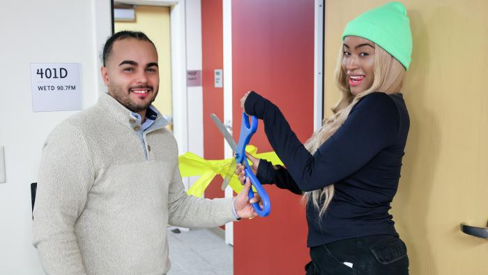 Dennis Dueno and Kimora Shi cut ribbon for new recording studio