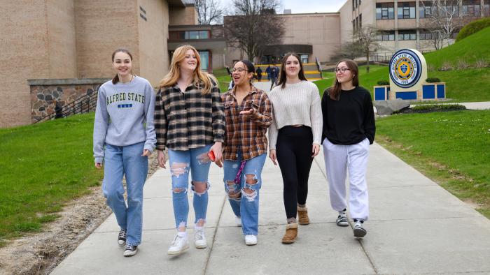 Female students walking on campus