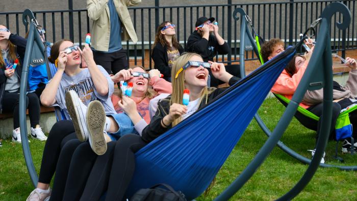 Students getting a glimpse of the solar eclipse