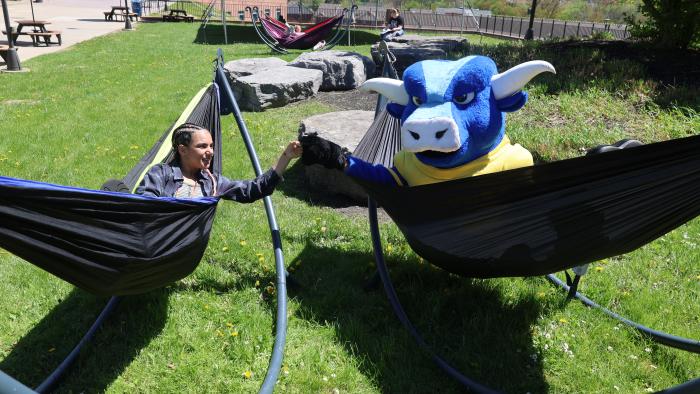 Student relaxes with Big Blue