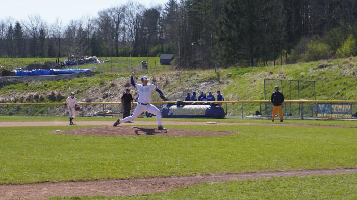 Alfred State player throws a pitch