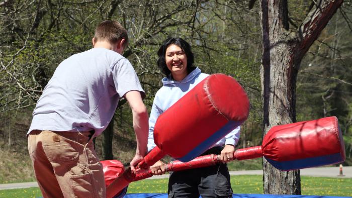 Students participate in inflatable jousting