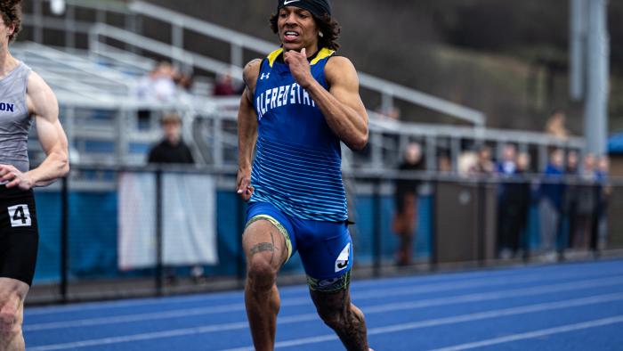 Alfred State student running track and field