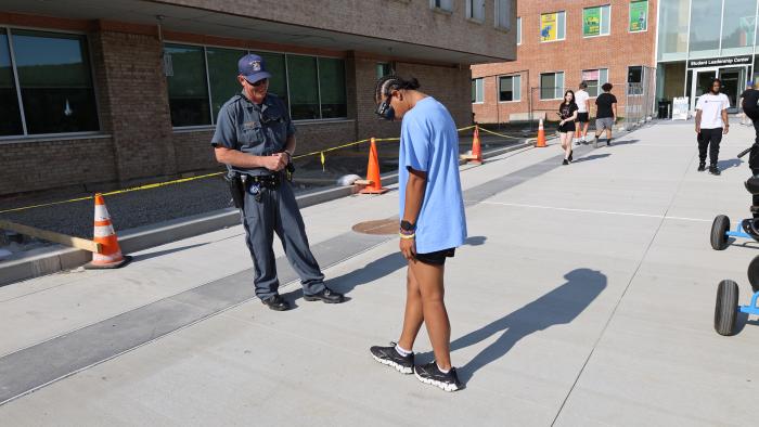 Student tests out drunk goggles 