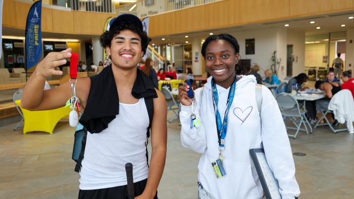 Students show off their safety keychains