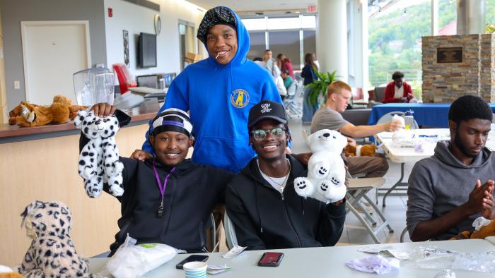 Students show off their new stuffed animals