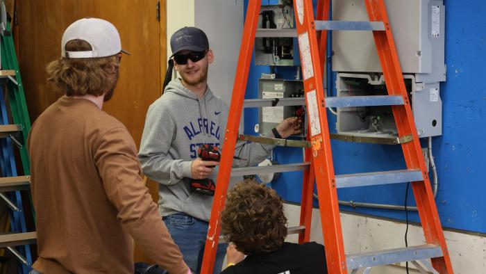 Students working in hands-on electrical lab