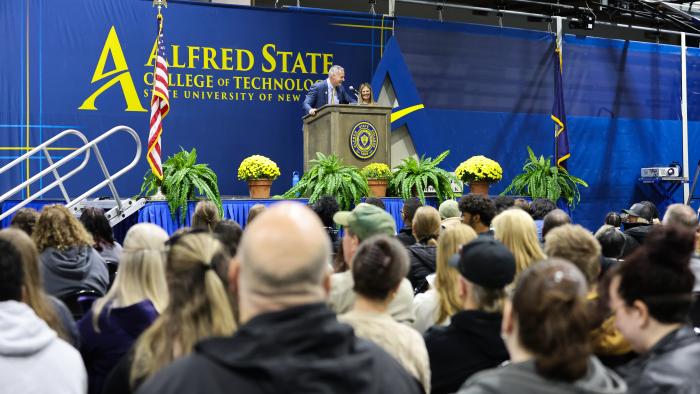 Steven Mauro addresses crowd at Open House
