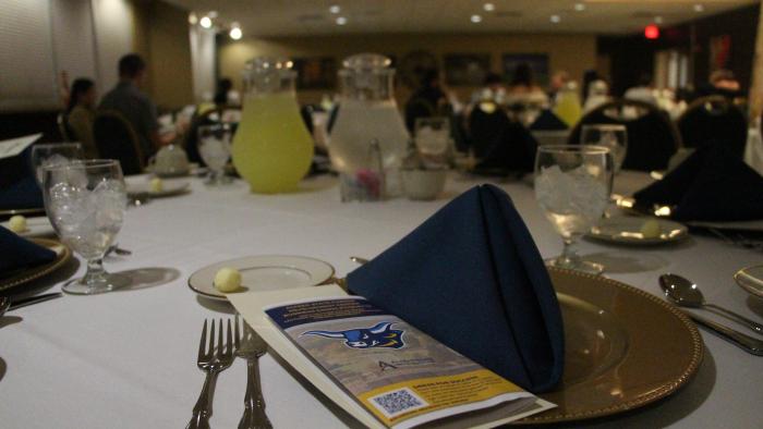 Formal dinner setup for annual Etiquette Dinner