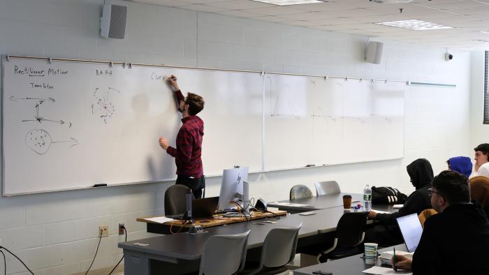 students take notes in class