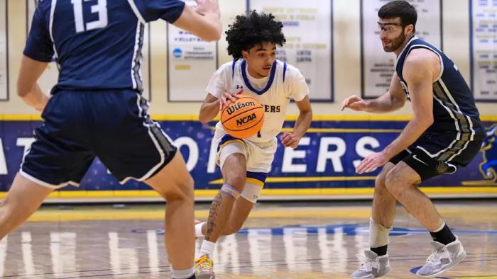 Jacob Gonzalez battles against Penn State-Behrend defenders.