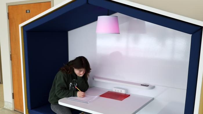 student sits in new study space
