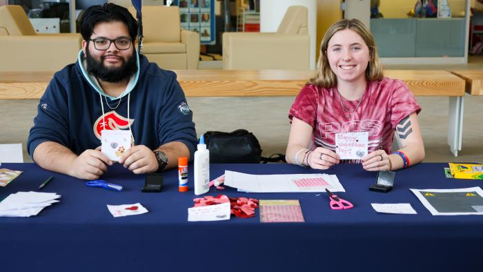 Member of Criminal Justice Club hold up their Valentines