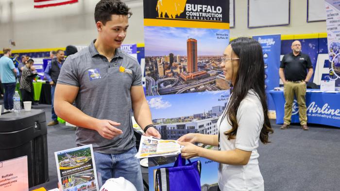 Student meets with a potential employer 