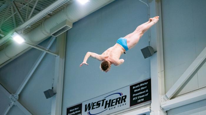Student Conor Compton competes in diving event