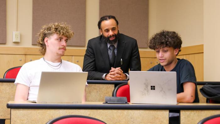 Professor Jarrad Childs with students in class