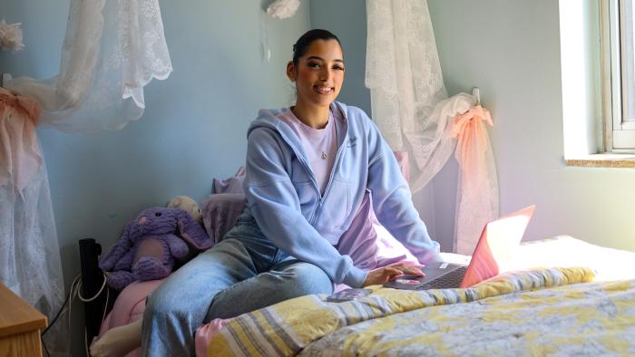 Student Lesley Chavez studies in her Peet Hall room