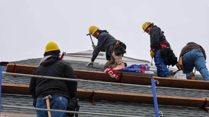 Building trades students working on House 59