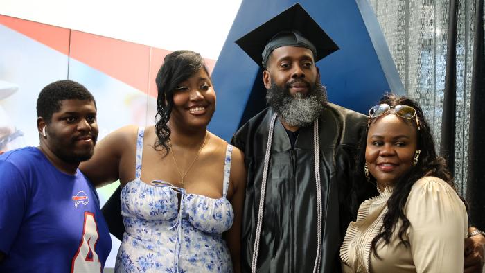 Alfred State Northland Campus commencement speaker, Frankie Harris, and his family